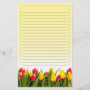 Papeterie La tulipe jaune rouge fleurit l'arrière - plan
