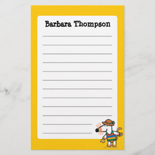 Papeterie Maisy rassemblant des coquilles à la plage