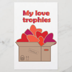Papeterie Mes trophées d'amour dans une boîte pleine de coeu