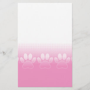 Papeterie Patte rose et blanche avec fond de papier journal