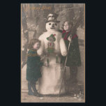 Papeterie Photo de Christmas Girls et Snowman Vintage<br><div class="desc">A charming antique 1910 French Christmas photo postcard of two pretty,  adorable little girls happily hugging and posing with their solive snowman friend,  as snow flow down upon them. Wishing a Joyeux Noel.</div>