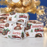 Papier Cadeau African American Boy avec chiot Plaid Christmas<br><div class="desc">🎄 Enveloppez vos cadeaux dans une joie festive avec ce design de Noël adorable ! 🎁 Doté d'un bébé afro-américain et de son 🐶 de chiot mignon, tous deux habillés de charmantes tenues de vacances rouges et vertes. Les bretelles du petit garçon, les 🎅 de Noël moelleux et les yeux...</div>