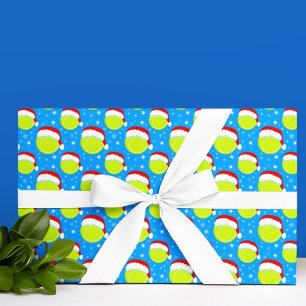 Papier Cadeau Balles de tennis portant le chapeau du Père Noël e