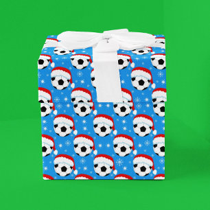 Papier Cadeau Ballon de football portant le chapeau du Père Noël