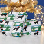 Papier Cadeau Black Labrador Christmas Winter View<br><div class="desc">Black Labrador Christmas Winter View Papier à envelopper pour les amoureux de les chiens qui aiment le Labrador.  Belle Silhouette Black Labrador avec Santa Hat.  Neige et arbres à feuillage persistant.  Créé par Naomi Ochiai.</div>