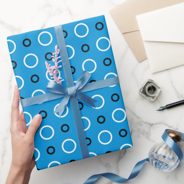 Papier Cadeau Bleu avec des cercles blancs et noirs (Cadeaux)