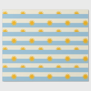 Papier cadeau bleu crème rayé soleil levant doré