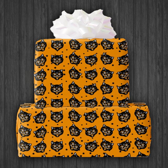 Papier Cadeau Chat noir Halloween souriant Face Orange Étoiles (Halloween black cat smiling faces on little black stars on bright orange wrapping paper roll.)