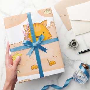 Papier Cadeau Chat orange dans une scène de plage avec château d