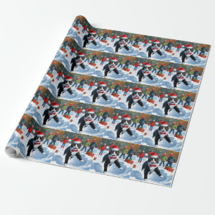 Papier Cadeau Chat Tuxedo Courant dans la Neige avec un Chapeau