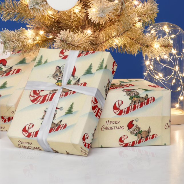 Papier Cadeau Chaton de Noël chevauchant une canne de bonbon (Vacances)