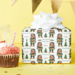 Papier Cadeau Cheeky Christmas Troll et Tree Delight<br><div class="desc">Ajoutez un peu de plaisir amusant à votre période de fêtes avec cette troll de Noël ludique qui se tient à côté d'un arbre festif. Avec son grand sourire espiègle et son ventre plein de rires, ce personnage fantaisiste de troll est prêt à apporter un joyeux malheur à vos célébrations...</div>