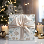 Papier Cadeau Coastère Noël Plage Coquillages Starfish Vacances<br><div class="desc">Papier d'emballage de Noël côtier avec coquillage peint à la main et motif d'étoiles de mer en bleu pastel,  or et beige. Parfait pour les thèmes tropicaux,  de plage et de décoration nautique.</div>