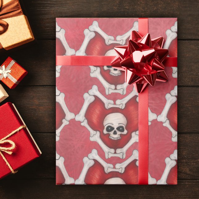 Papier Cadeau Coeurs rouges dans les os avec des crânes en centr (Deep red hearts outlined in bones with skull  inside on red starburst patterned roll wrapping paper.)