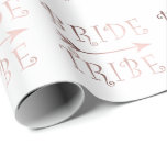 Papier Cadeau conception rose de tribu de jeune mariée d'or de<br><div class="desc">Conception à la mode et élégante représentant le texte rose de "tribu de jeune mariée" d'or de faux et une flèche. Vous pouvez customiser le produit en choisissant la couleur d'arrière - plan.</div>