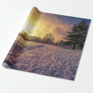 Papier Cadeau Coucher de soleil sur le parc d'hiver enneigé