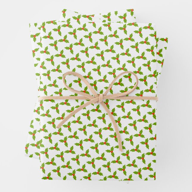 Papier cadeau de Noël main levée avec houx et baie (En situation)