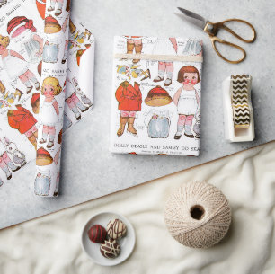 Papier cadeau de poupées en papier à patiner sur g