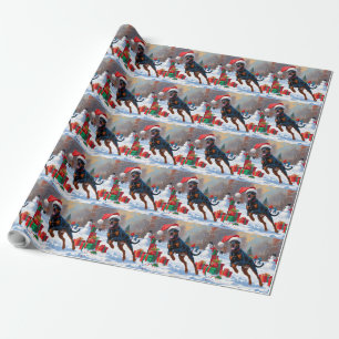 Papier Cadeau Doberman courant dans la neige avec un chapeau de