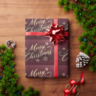 Papier Cadeau Écriture 'Joyeux Noël' en feuille d'or luxueuse