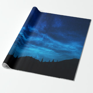 PAPIER CADEAU ÉTOILES LUMINEUSES DANS UN CIEL NOIR ET BLEU