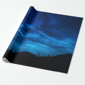 PAPIER CADEAU ÉTOILES LUMINEUSES DANS UN CIEL NOIR ET BLEU