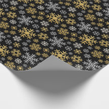 Flocons d'or et d'argent sur fond noir