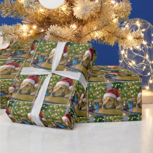Papier Cadeau Golden Retriever de Noël regardant un train jouet