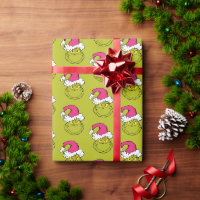 Grinch avec un chapeau de Père Noël rose