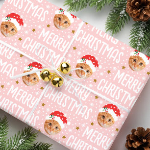 Papier Cadeau Joli visage de Noël dans un trou Photo de compagni