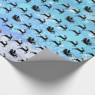 Papier Cadeau Le Père Noël et son renne volant Noël