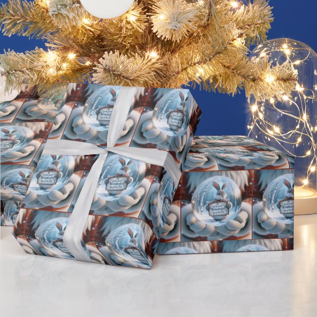 Papier Cadeau Le Père Noël tient un lobe de neige (Vacances)