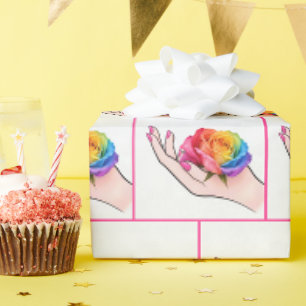 Papier Cadeau Main de femme berçant une rose arc-en-ciel