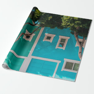 Papier Cadeau Maisons vertes et bleues à côté des arbres sur le
