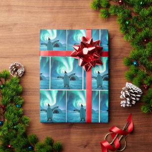 Papier Cadeau Manchot heureux dansant sous les aurores boréales