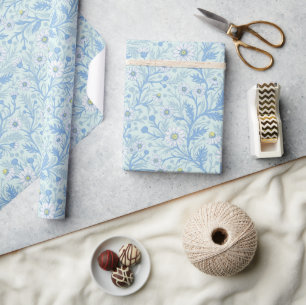 Papier Cadeau Marguerites en blanc et bleu sur verre de mer