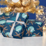 Papier Cadeau Marine Vie Tropicale Motif Marine Bleu Noël<br><div class="desc">Papier d'emballage cadeau de Noël tropical avec étoiles de mer,  chevaux de mer et boules d'aqua bleu imprimé sur couleur bleu marine foncé.</div>
