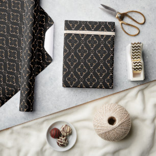 Papier Cadeau Motif or sur noir.