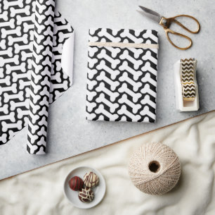 Papier Cadeau Motif os blanc sur coutume noir