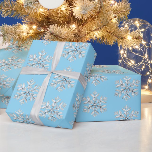 Papier Cadeau Noël aux flocons de neige bleus blancs (Vacances)