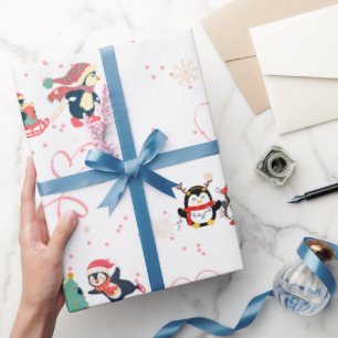 Papier Cadeau Noël des pingouins plein de coeur