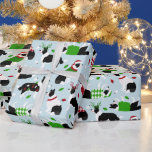 Papier Cadeau Papier d'enrobage Collie Bordure de Noël<br><div class="desc">Chiens de Collie à la frontière mignonne dans des tenues de vacances festives portant chapeaux de Père Noël,  bois,  cordes de lumières et pois de polka et chandails de Jacquard sur un arrière - plan bleu avec des ornements éparpillés.</div>