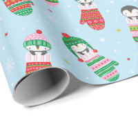 Pingouins de Noël mignons en mitaines bleu clair