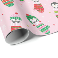 Pingouins de Noël mignons en mitaines rose pâle