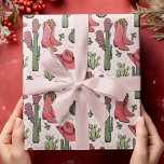 Papier Cadeau Pink Western Howdy Christmas Cowgirl<br><div class="desc">Ce papier d'emballage Western Howdy Christmas Cowgirl amusant et festif présente des illustrations dessinées à la main de bottes de cowgirl de Noël,  de casquettes,  mitaines,  cactus,  baies saintes et étoiles. Le tout contre un élégant arrière - plan rose très doux.</div>