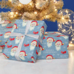 Papier Cadeau Retro Père Noël sur Pastel Blue Christmas<br><div class="desc">Ce papier d'emballage cadeau de Noël classique offre un arrière - plan bleu pastel avec un graphique du Père Noël. Le design est accentué de flocons de neige et d'arc et le texte "MERRY CHRISTMAS".</div>
