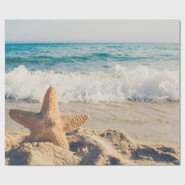 Papier Cadeau Starfish sur une plage de sable Photo (Plat)