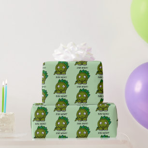 Papier Cadeau Stégosaure de dessin animé vert mignon avec un jeu