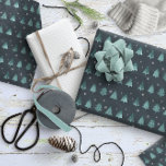 Papier Cadeau Teal ID863<br><div class="desc">This gift wrap feas a subtle pattern of stylized Christmas trees and snowflakes with a textured-effect in shades of watchet blue on a deep teal background . Search ID861 thru ID864 to see additional color options and other products in this modern,  Christmas design set.</div>
