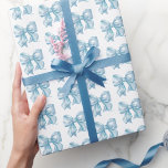 Papier Cadeau Tendance Coquette Bébé Motif Nœud Bleu<br><div class="desc">Papier d'emballage arc-en-ciel bébé bleu aquarelle. Ajoutez une touche douce et élégante à vos cadeaux avec ce papier d'emballage charmant présentant un motif d'arc-en-ciel bébé bleu aquarelle. Parfait pour une baby shower pour garçon ou une douche de mariée avec un thème « Quelque chose de bleu avant que je le...</div>